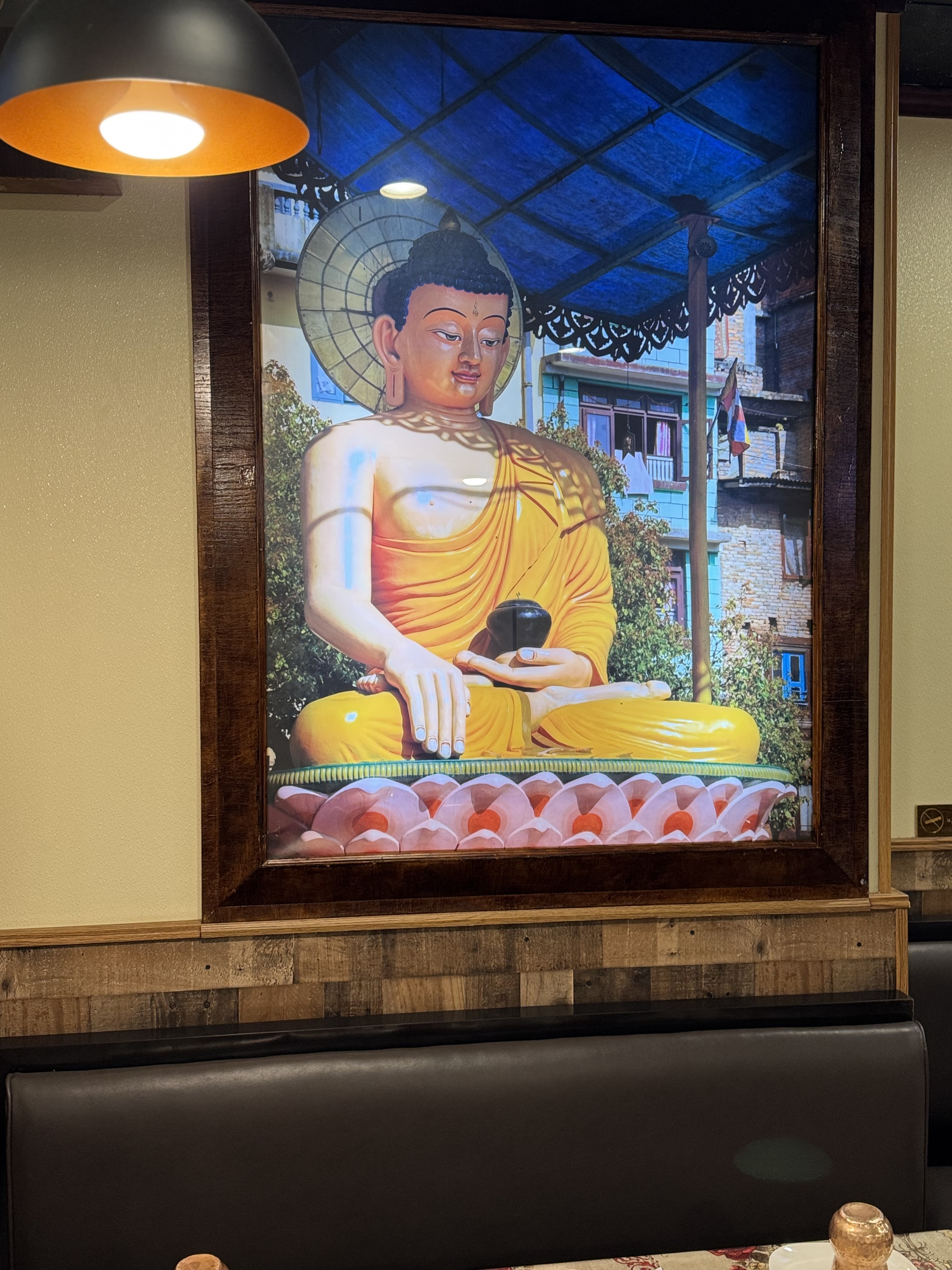 Traditional Buddha artwork at Simon's Kitchen
