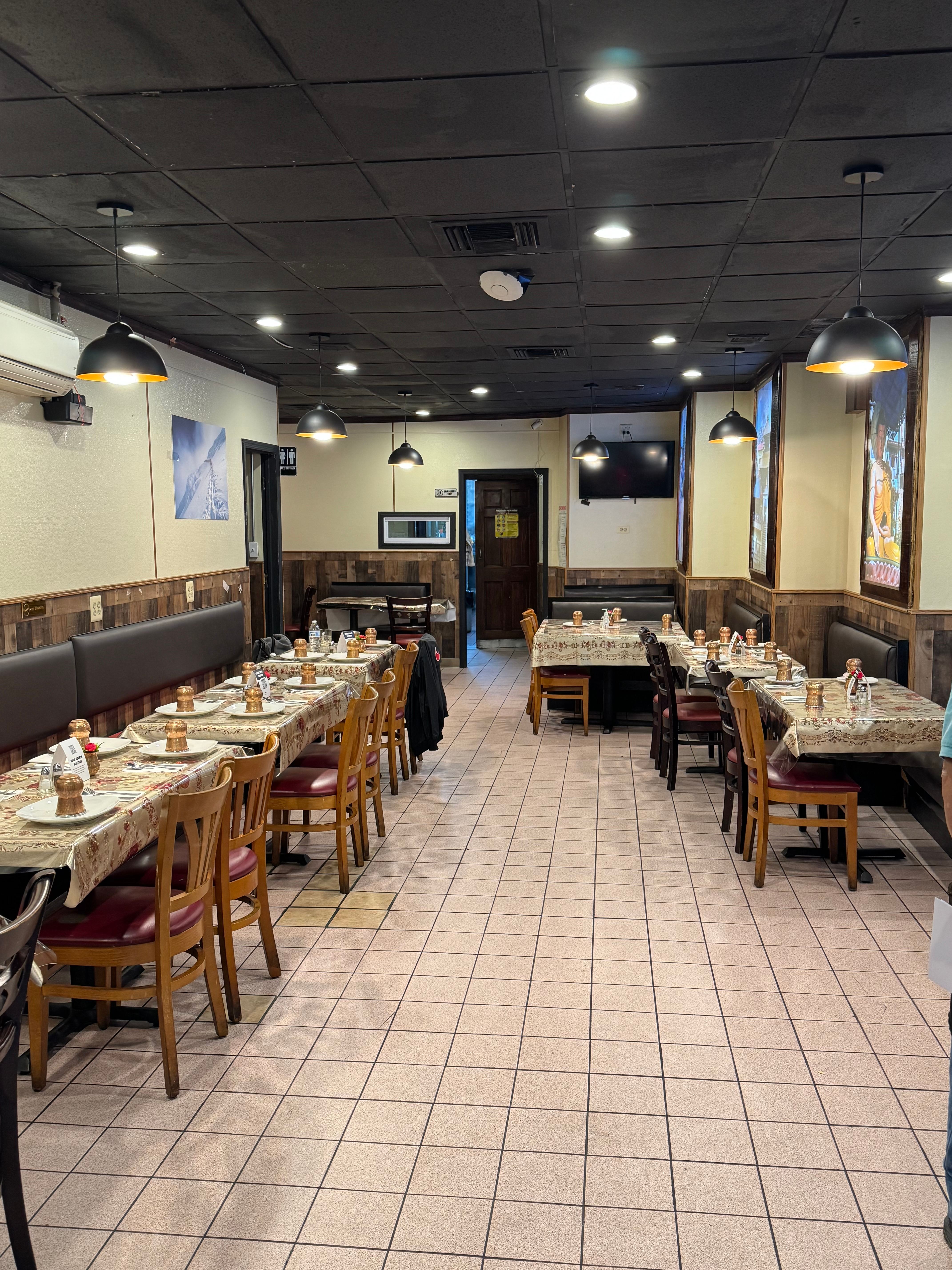 Elegant dining area at Simon's Kitchen with traditional decor